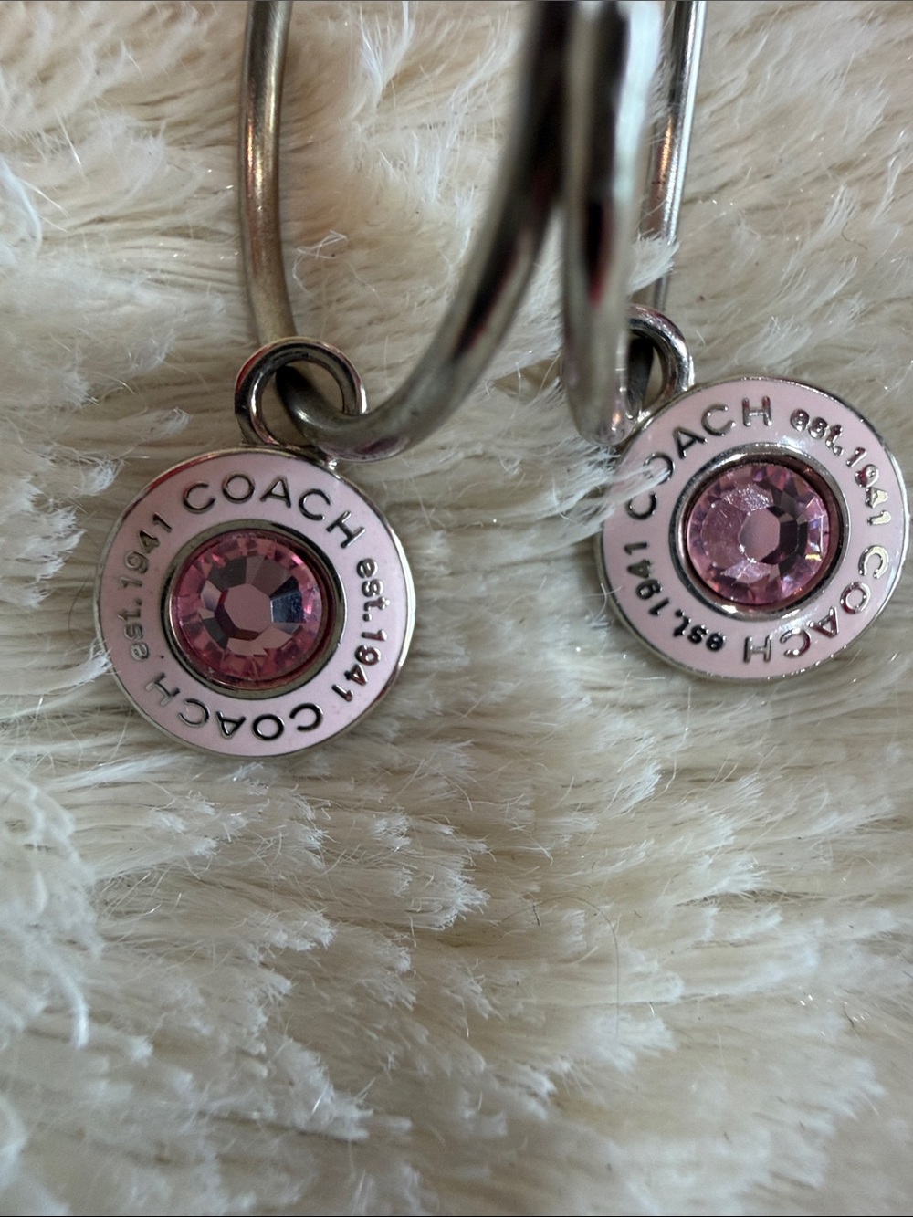 Coach Silver-Tone Hoop Earrings with Pink Crystal Centers - Picture 2 of 3